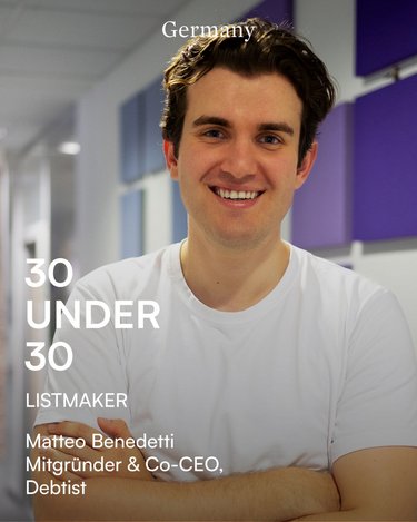 Matteo Benedetti, co-founder and co-CEO of Debitis, smiles in a modern office. He is featured on the '30 Under 30' list.