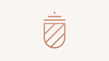 Logo der EBS Universität in bronze auf cremeweiß